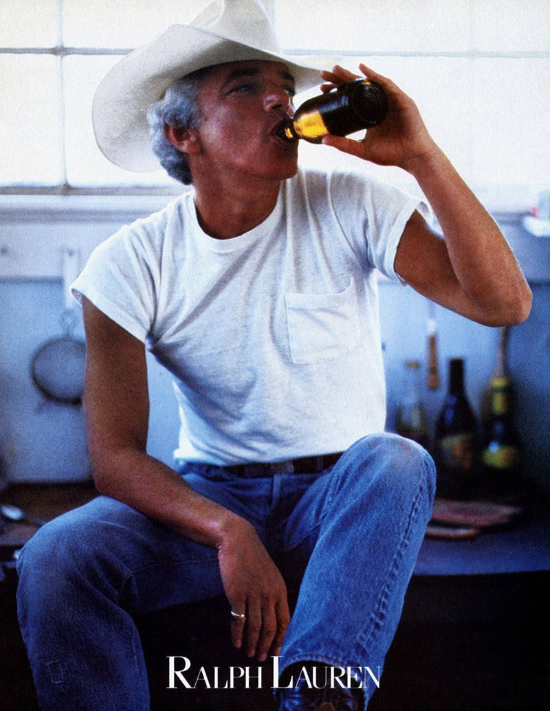 Vintage Ralph Lauren advert showing a man in a white T-shirt and cowboy hat